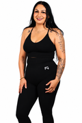 Front view of black Fortis (BG) leggings with a small white hip logo.