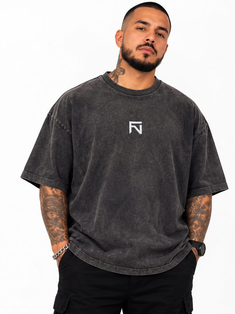 Front view of grey Fortis BOLD (Back) oversized tee with a small white chest logo.